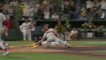 Brandon Marsh nabs winning run at home after review