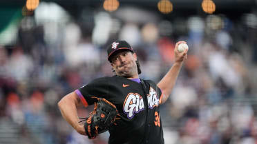 Robbie Ray K's Adolis García