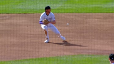 Ryan McMahon's glove breaks fielding a grounder