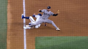 Fernando Cruz nabs Josh Jung at third after review