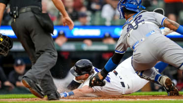 Salvador Perez tags out Zach McKinstry after review