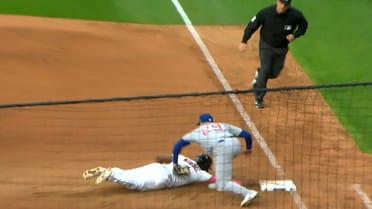 Jacob Webb picks off Angel Martínez