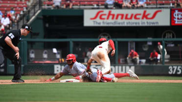 Dane Myers steals second base after review