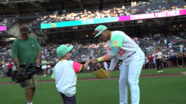 Young fan signs with the Padres