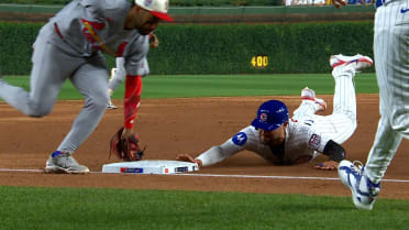 José Fermín tags third base to get the forceout