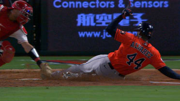Yordan Alvarez out at home after challenge