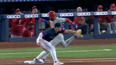 Edmundo Sosa is safe at first after review