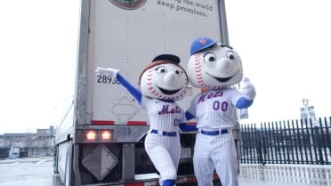 Mr. and Mrs. Met load truck