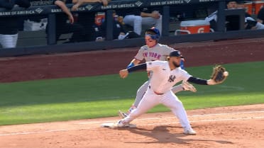 Nick Morabito safe at first after challenge