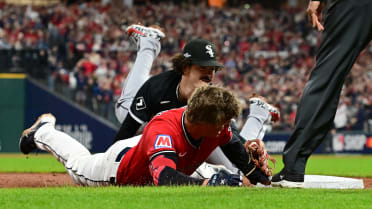 White Sox relay to hose Petey Halpin at third base