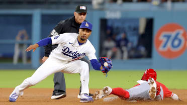 Zach Neto steals second after review