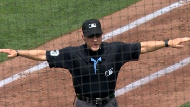 Max Muncy safe at first after review