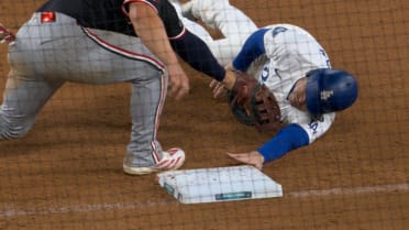 Freddie Freeman is safe at first after review
