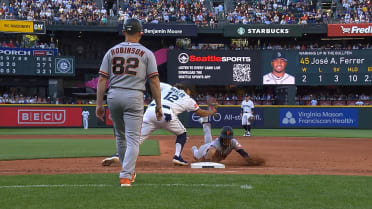 Grant McCray safe at first after a review