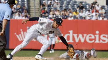 Yankees turn strike-'em-out, throw-'em-out DP in 10th