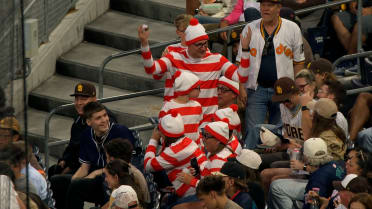 Family caught in matching "Where's Waldo?" costumes