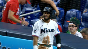 Otto Lopez scores on a throwing error