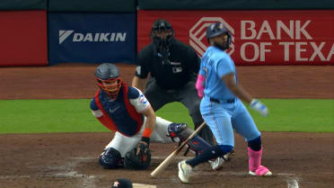 Vladimir Guerrero Jr. reaches with a single