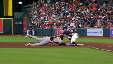 Dylan Beavers is safe at first base after review