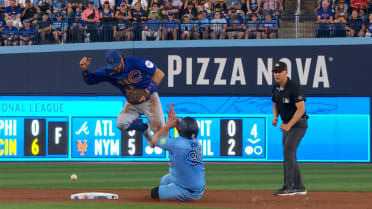 Alejandro Kirk is safe at second after review 