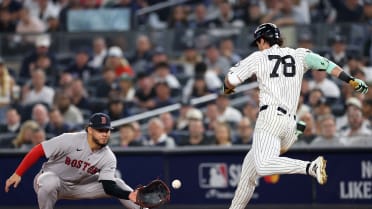 Spencer Jones safe at first after challenge
