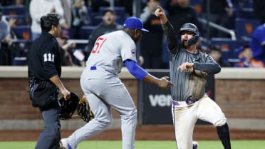 Call stands, Cubs throw out tying run to end game