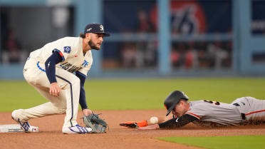 Turner Hill steals second base