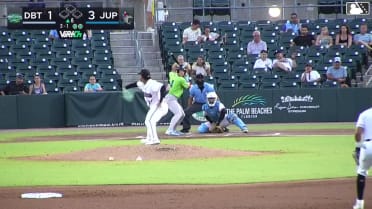 Tyson Lewis homers (3) on a fly ball to center field.