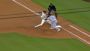 Andy Pages is picked off at first after review