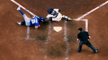 Sharlon Schoop throws out Garrett Stubbs at home