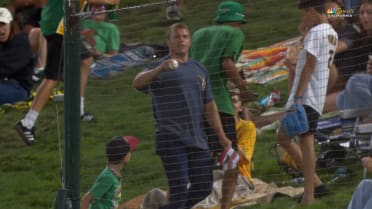 Fan catches a foul ball with his hat