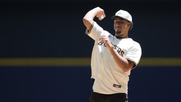 Jordan Love throws the first pitch on Memorial Day