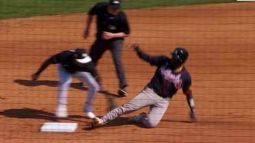 Marco Luciano throws out Chadwick Tromp at second