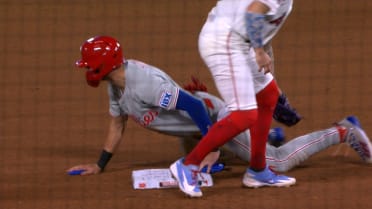 Trea Turner steals second base