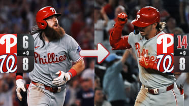 Phillies take lead with eight-run 9th inning