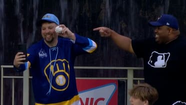 Brewers fan gets hyped after catching home run ball