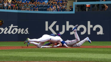 Nathan Lukes throws out Heim at 2nd after review