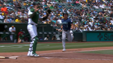 Cole Young scores on a throwing error