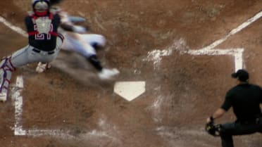 Luisangel Acuña out at home after review