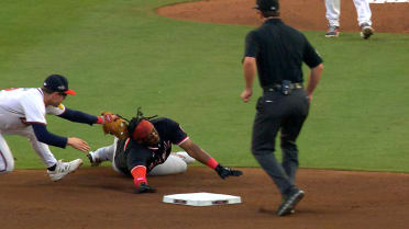 Josh Bell is thrown out at second after review