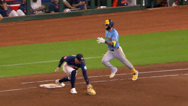 Joey Ortiz is out at first after challenge