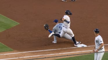 Wells beats the throw to first, call overturned