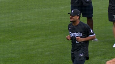 Rome Odunze throws out the first pitch