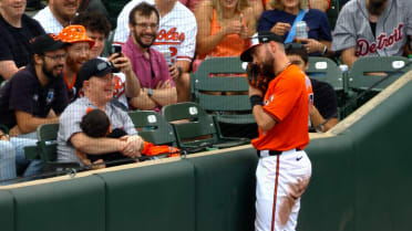 Colton Cowser says hello to a sleeping child