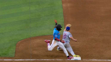 Mets turn double play after a review