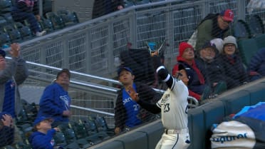 Royce Lewis makes catch, hits into netting
