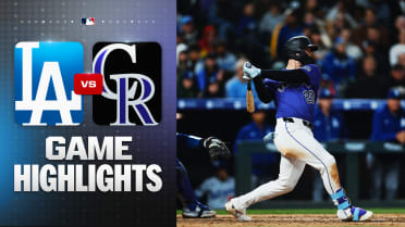 Troy Johnston hits a two-run double in Rockies' win