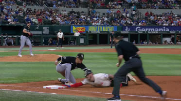 Adrian Houser picks off Jonah Heim