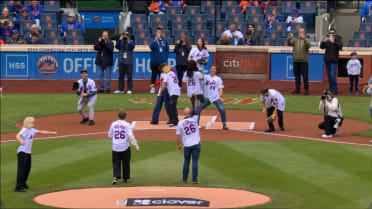 U.S. Olympic figure skating team throws first pitch