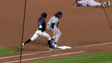 Rockies combine to throw out Jeff McNeil at first base